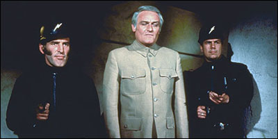 Hey, boss. You know we have to set up all these targets with the faces of people Bond has loved or killed in the past, which can then act as a PALACE OF REGRET AND DESPAIR for the guy, a bit like the one in The Man With The Golden Gun? And you know how we’re meant to capture him and bring him in with a bag on his head? Doesn’t that mean you’re expecting him - somehow - to kill us henchmen and take the bag off? You’ve planned for that? Oh.